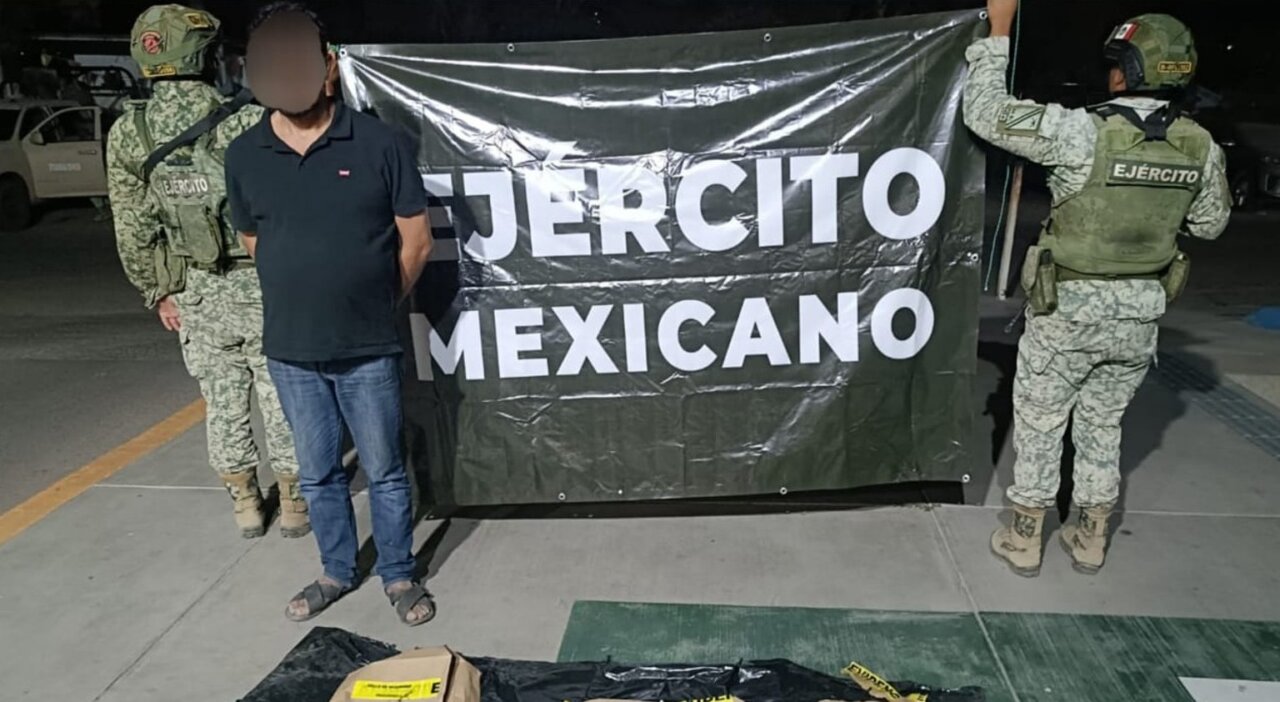 detenido con pistolas y drogaok