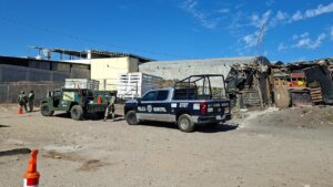 Vista del perímetro militar y policial en las inmediaciones del Mercado de Abastos de Culiacán, donde fueron localizados los cuerpos.